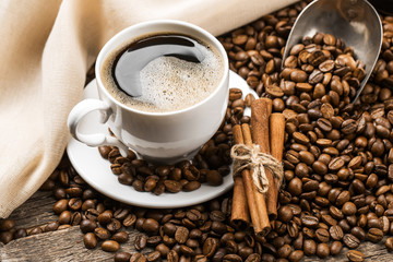 cup of coffee and coffee beans