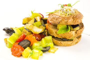 steamed vegetables tomatoes eggplant and pepper with rye loaves