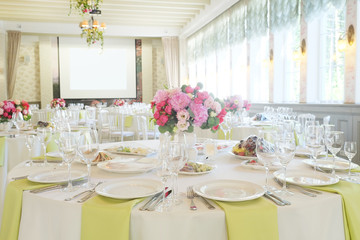Cafe interior with the served tables