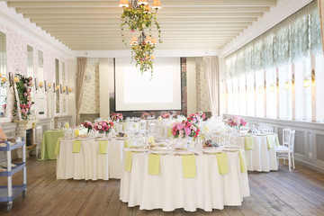 Cafe interior with the served tables