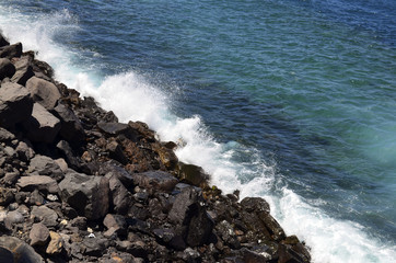 Ocean water and stones texture.