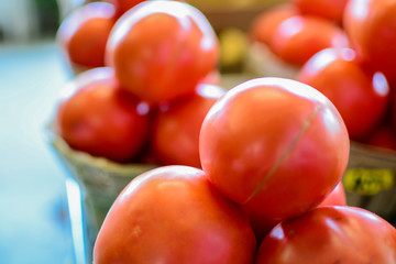 Tomatoes for sale at a produce stand