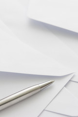 white envelope  with pen
