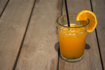 Glass full of fresh squized orange juice