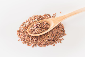 Brown flax seed on clean kitchen table