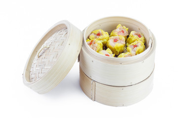 Shrimp dumplings in a bamboo steamer