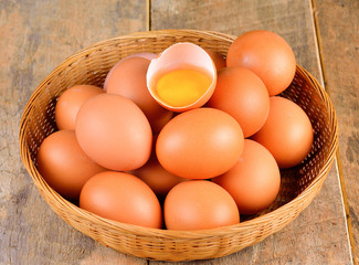 Raw eggs  on wooden background