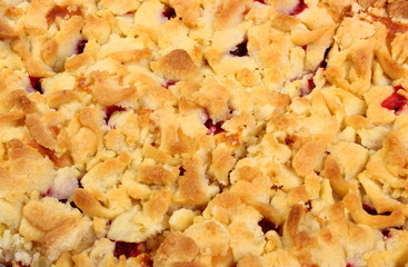 Fresh baked yeast cake with strawberries