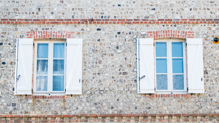 Windows of classic brick house