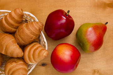 Ripe fruit and croissants