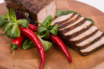 pork slices with vegetables on the side