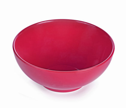 Empty red ceramic bowl isolated white background