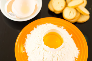 Strong yellow colored plate with flour crater containing cracked