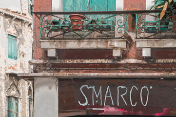 pointer to San Marco on the wall of a cafe