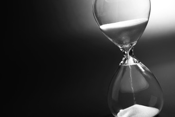 Hourglass on dark background