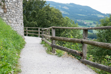 Fototapeta na wymiar Stone path near Gruyere castle in Switzerland