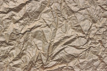 Close-up Of Rough Brown Wrinkled Packaging Paper Texture Backgro