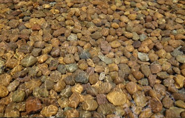 Pebble stone under water