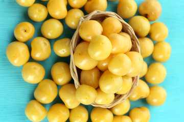 Ripe cherry-plums on wooden table close up