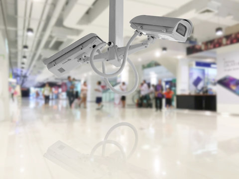 CCTV Security camera shopping department store background.