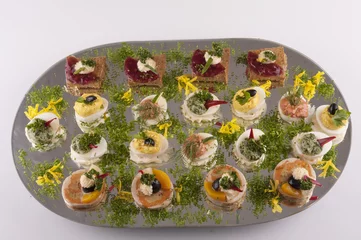 Zelfklevend Fotobehang Glass platter of snacks  © npls