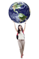 Casual student is holding globe 1