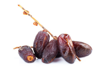 Medjool dates from above isolated on white background