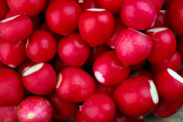Heap of fresh radishes close up