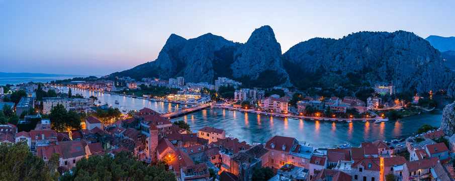 Panorama city Omis lit at sunset (from Mirabella tower)