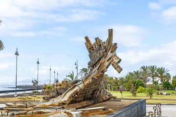 Fototapeta na wymiar remains of old shipwreck in a park in Arrecife