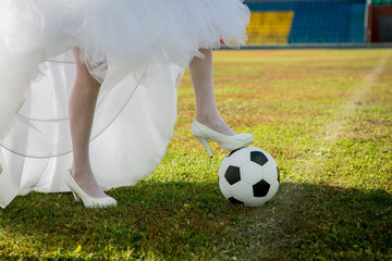 Bride plays soccer