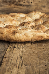 pita bread on wooden table