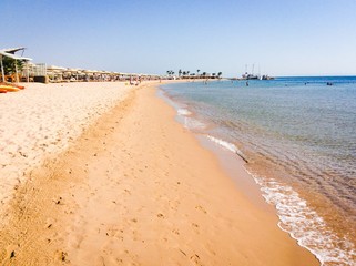 great beach. a broad band of vibrant sandy beach in the warm sea