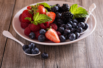Variety of summer berries on a plate