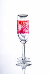 Three glasses in a row on white background