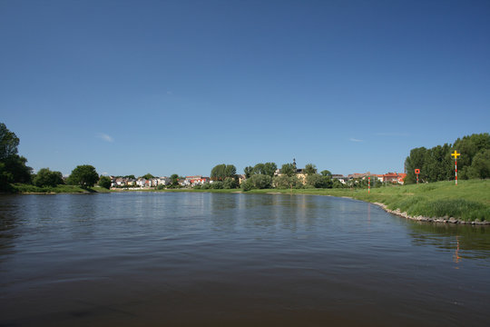 Being on the waters of the Elbe River with view to the town Coswig in Saxony Anhalt, copy space provided
