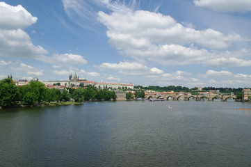 Fototapeta na wymiar View of the Old Town and Charles Bridge over Vltava river in Prague, Czech Republic