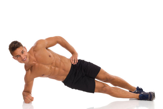 Side Elbow Plank. Isometric Stomach Exercise