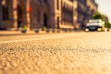 City on a sunny day, a quiet city street on which the car travel