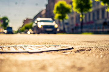 City on a sunny day, a quiet city street on which the car travel