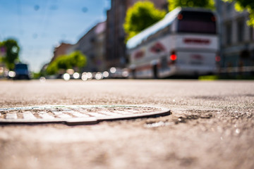 City on a sunny day, a quiet city street on which the bus travel