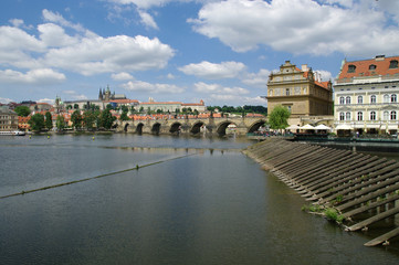 Obraz premium View of the Old Town and Charles Bridge over Vltava river in Prague, Czech Republic