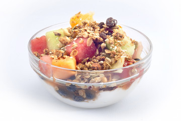 fresh fruit bowl topped with granola