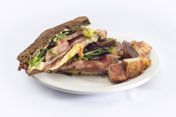 ham egg tomato breakfast sandwich hash browns