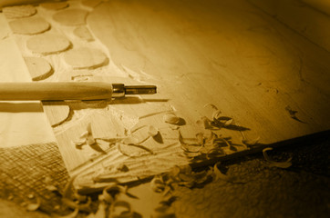 woodcut block and chisel