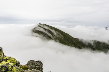 Clouds surrounding the peak