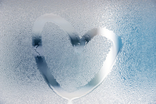 Drawn Heart On The Wet Glass