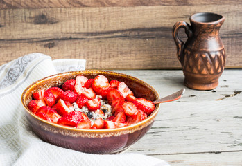 oatmeal with poppy seeds, raisins and berries, healthy breakfast