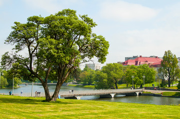 Fototapeta premium View of the Lower lake and the pedestrian bridge in Kaliningrad
