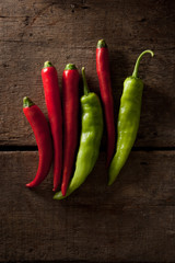 fresh chili isolated on a wood background